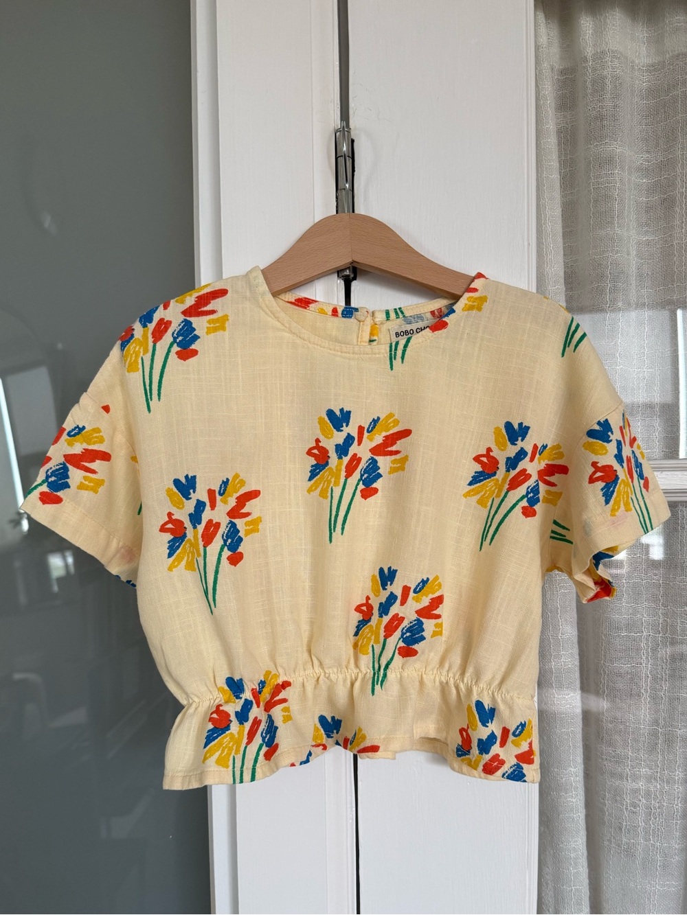 Bobo Choses Yellow Top with Blue, Red, Green and Yellow Floral Marks